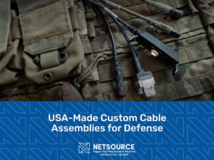 Featured_A set of rugged military communication cables and connectors laid out on a camouflage tactical vest.